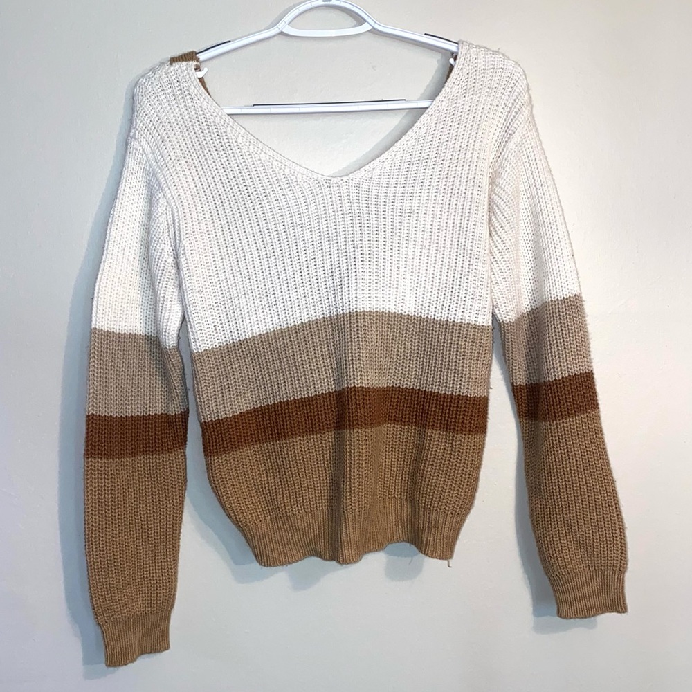 Neutral sweater with criss-cross back